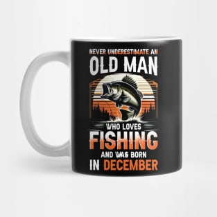 Never Underestimate An Old Man Who Loves Fishing And Was Born In December Mug